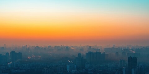 Serene city skyline at dusk, showcasing a vibrant sunset with hazy silhouettes of buildings and a gradient sky.