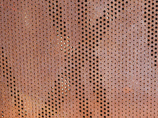 Grunge metal background or texture with holes, scratches and cracks.