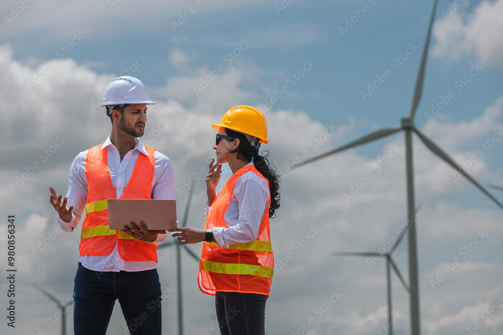 Aufkleber man and woman engineer worker wind turbine handshake success agreement survey discuss operational pl