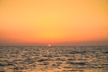 Fototapeta premium reflections of the setting sun in the Mediterranean sea