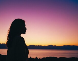 female silhouette against the sunset