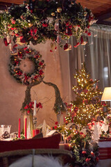 Christmas table setting indoors Christmas decoration in classic red and gold color scheme