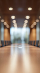 Fototapeta premium Blurry boardroom with chairs and lights reflected on the glossy table surface