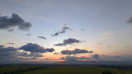 Beach dawn, sunrise. Evening sky with clouds. Golden hours. afternoon vanilla sky. Seashore sunburn...