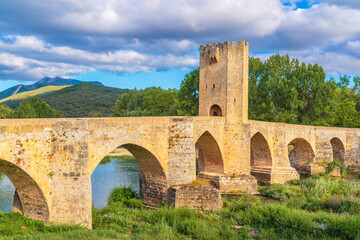 View of the medieval bridge in the historic village of Frías, Spain, over the River Ebro, built in Gothic style in the 13th century