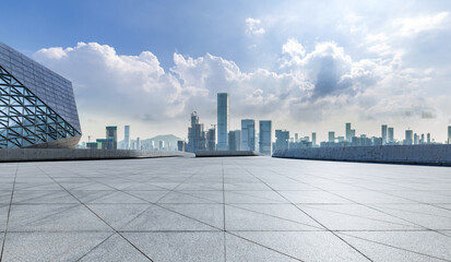 Empty square floor and city skyline with modern buildings scenery in Shenzhen. car advertising background.