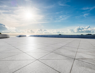 Empty square floor and sky clouds nature landscape at seaside. car advertising background.