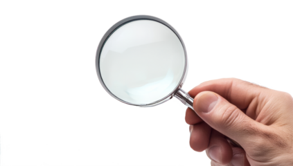 Hand holding magnifying glass
