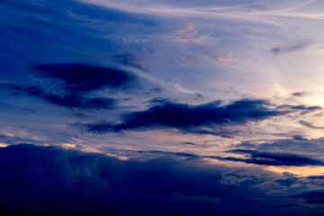 Obraz premium Beautiful sunset cloudy blue sky