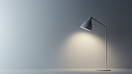 Minimalist lamp on a plain surface with space for design features text