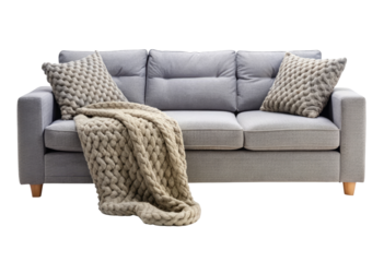 Gray sofa with blanket and pillow isolated with transparent background.
