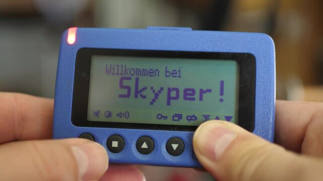 Vintage Deutsche Telekom Pager Showcasing Messaging Features from 1996