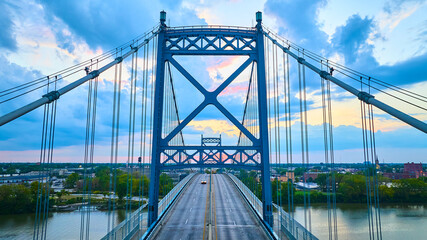 Aerial View of Blue Suspension Bridge over Maumee River at Golden Hour