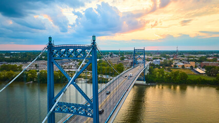 Obraz premium Aerial View of Toledo Anthony Wayne Bridge at Sunset