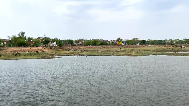 Nenura tal lake in khajuraho the group of monuments of hindu and jain temples in chhatarpur district, madhya pradesh, India.Unesco world heritage site.