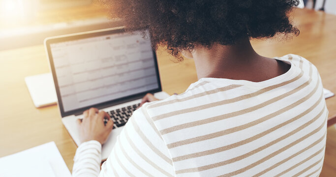 Woman, home and typing with laptop for remote work and blogging as freelance writer. Back, female person and table with research for headline story or news article for newspaper as journalist