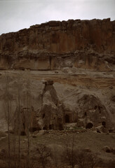 Ancient Cave Dwellings Amidst Rocky Terrain