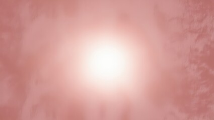 A soft pink glow at the center of a blurred background, creating a dreamy and abstract effect.
