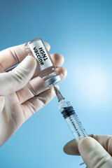 Close-up of H5N1 avian flu virus Vaccine and syringe