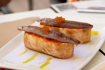 Tapa de sardinas ahumadas
