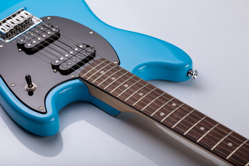 Close-up of blue electric guitar steel strings.  Close-up image. Studio shot. 