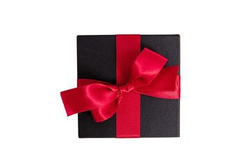 Black Friday Sale. Black gift box with red ribbon bow isolated on white transparent, top view