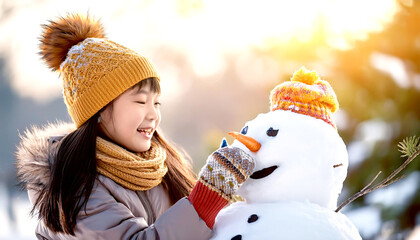 Kind baut Schneemann 