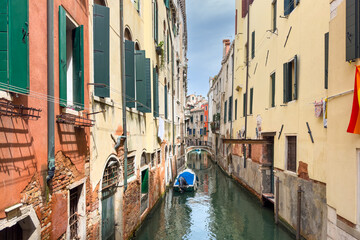 Gondola photo in Venice. Beautiful video with touristic taxi and local gondola boats cruising on the channels of Venice. Landmark landscape view of Italy.