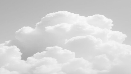Naklejka premium White Clouds from above. Aerial view of the fluffy white cloud on blue sky. Top view from an airplane over white clouds