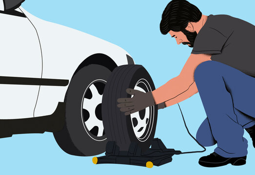 Man changing a tire on a white car