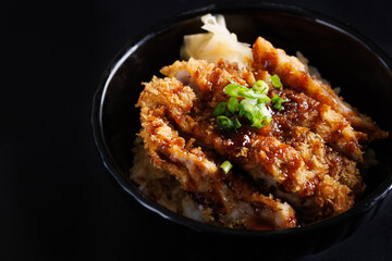 Chicken tonkatsu with rice japanese food isolate in black background