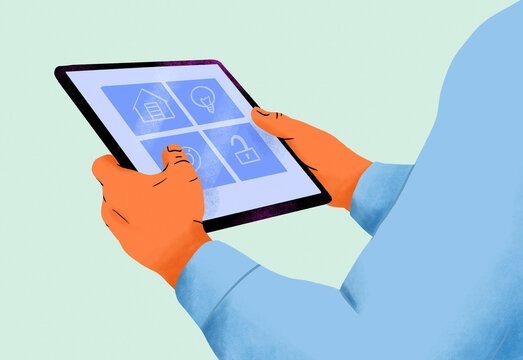 Hands holding a tablet with icons on the screen against a teal background.