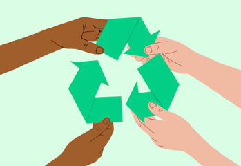 Hands of diverse people holding green recycling symbol together above a light background.
