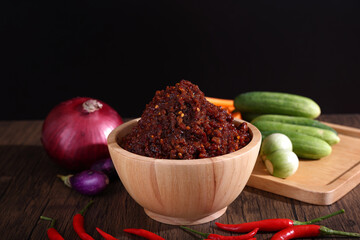 pork shrimp chilli dip local thai food sauce isolated in wood background