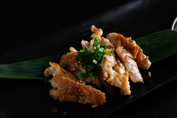 Chicken Teriyaki grill chicken Japanese Food isolate in black background