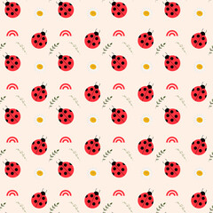 A charming seamless pattern ladybugs and chamomile