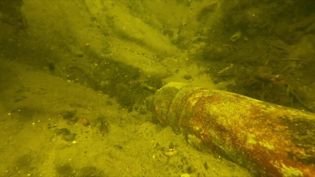 Grenade in the Tollense River - Underwater footage shows the discovery of an ancient shell in a river, discovered during an archaeological dig. It's defused.