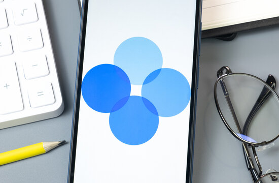 New York, USA - 30 August 2024: OKB Logo on Phone Screen, Crypto Icon on Display