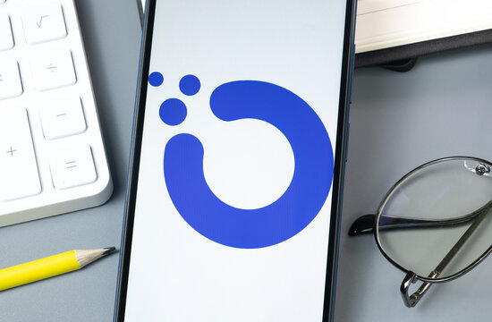 New York, USA - 30 August 2024: Orchid OXT Logo on Phone Screen, Crypto Icon on Display