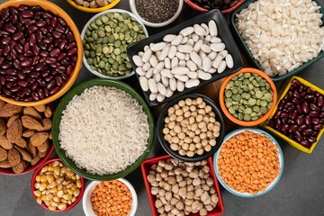 several pots with raw grains for preparing healthy food