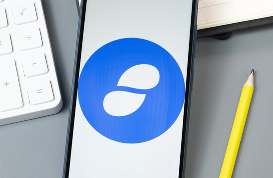 New York, USA - 30 August 2024: Status SNT Logo on Phone Screen, Crypto Icon on Display