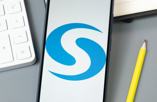 New York, USA - 30 August 2024: Syscoin SYS Logo on Phone Screen, Crypto Icon on Display