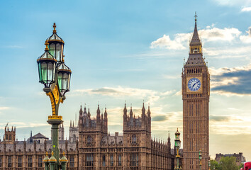 Fototapeta premium Big Ben tower and street lamp on Westminster bridge at sunset, London, UK