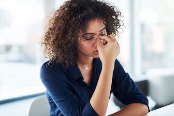 Obraz premium Thinking, stress and woman in office, headache and disappointed with ideas, overworked and business. Frustrated, online and copywriting for project, serious and person with migraine, sad and tired