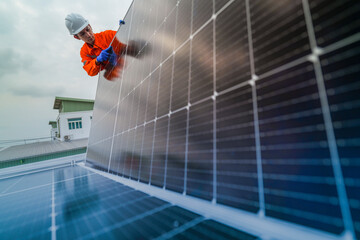 engineer man inspects construction of solar cell panel or photovoltaic cell by electronic device....