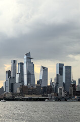 view of midtown manhattan frm weehawken waterfront (hudson river west new york city skyline skyscrapers sightseeing travel tourism destination) nyc dramatic sky harbor vista scenic buildings nj jersey