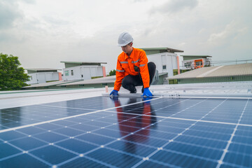close up on grid of technology renewable solar energy. construction solar panels system on roof. Installing solar photovoltaic panel system. background of blue of solar cell system and structure roof.