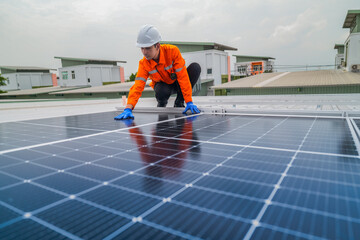 close up on grid of technology renewable solar energy. construction solar panels system on roof. Installing solar photovoltaic panel system. background of blue of solar cell system and structure roof.