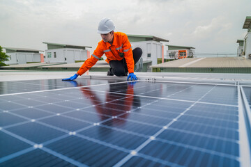 close up on grid of technology renewable solar energy. construction solar panels system on roof. Installing solar photovoltaic panel system. background of blue of solar cell system and structure roof.