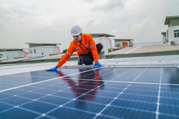 close up on grid of technology renewable solar energy. construction solar panels system on roof. Installing solar photovoltaic panel system. background of blue of solar cell system and structure roof.